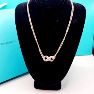 Authentic Tiffany & Co. Infinity pendant, double silver chain16". Marked Tiffany
